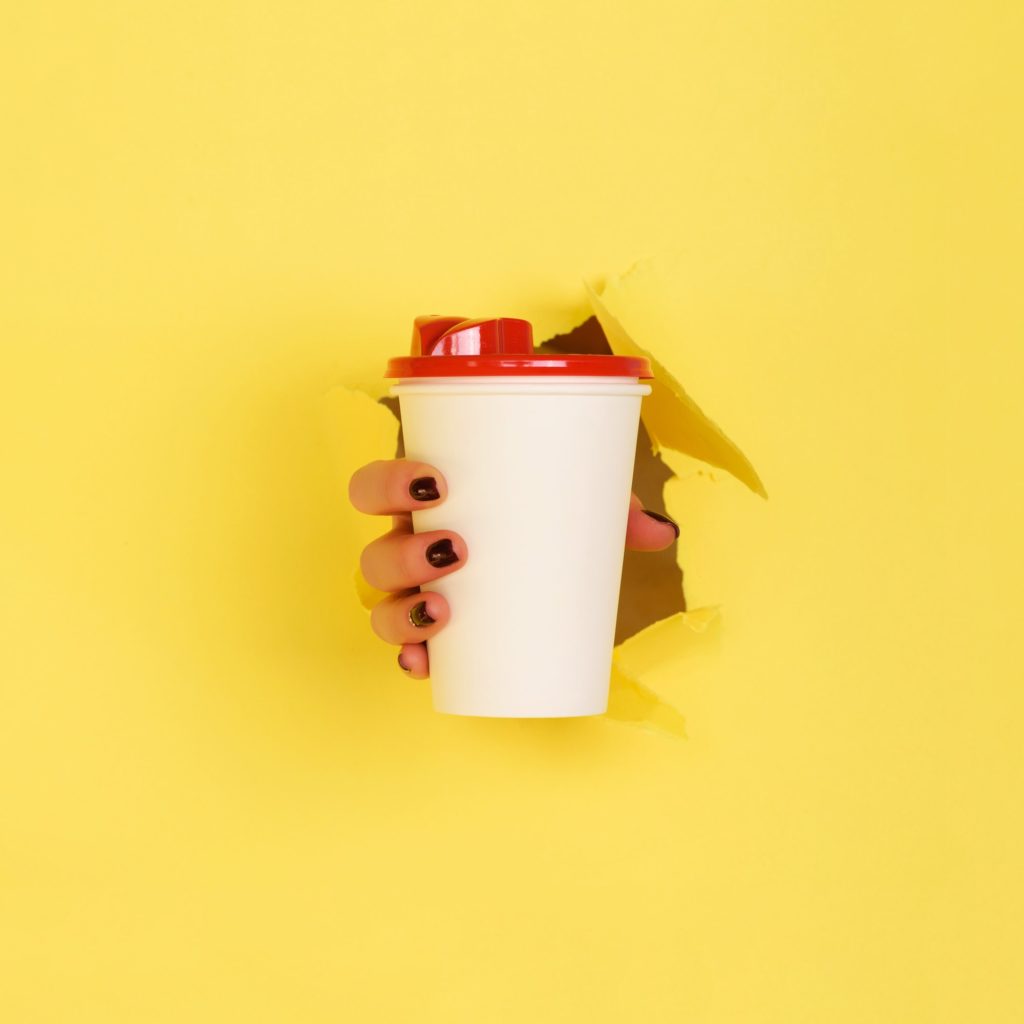 pharmacy business loan - female hand holding white paper mug on yellow background take away coffee cup concept mock up with 1024x1024 - Pharmacy Business Loan - photo Female hand holding white paper mug on yellow background. Take away coffee cup concept. Mock up with