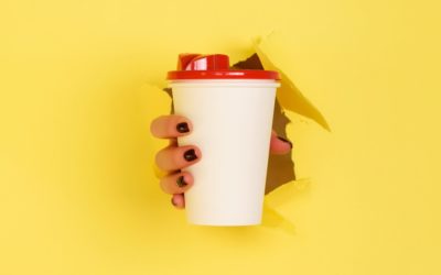 - Understanding The Franchise Way 3 | Family Capital Funding Female hand holding white paper mug on yellow background. Take away coffee cup concept. Mock up with